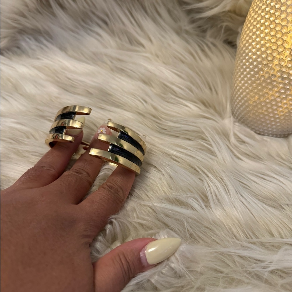 Gold and black cuff